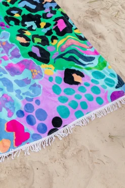 Beach Towel in Electric Leopard by Kasey Rainbow