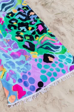 Beach Towel in Electric Leopard by Kasey Rainbow
