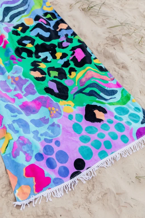 Beach Towel in Electric Leopard by Kasey Rainbow